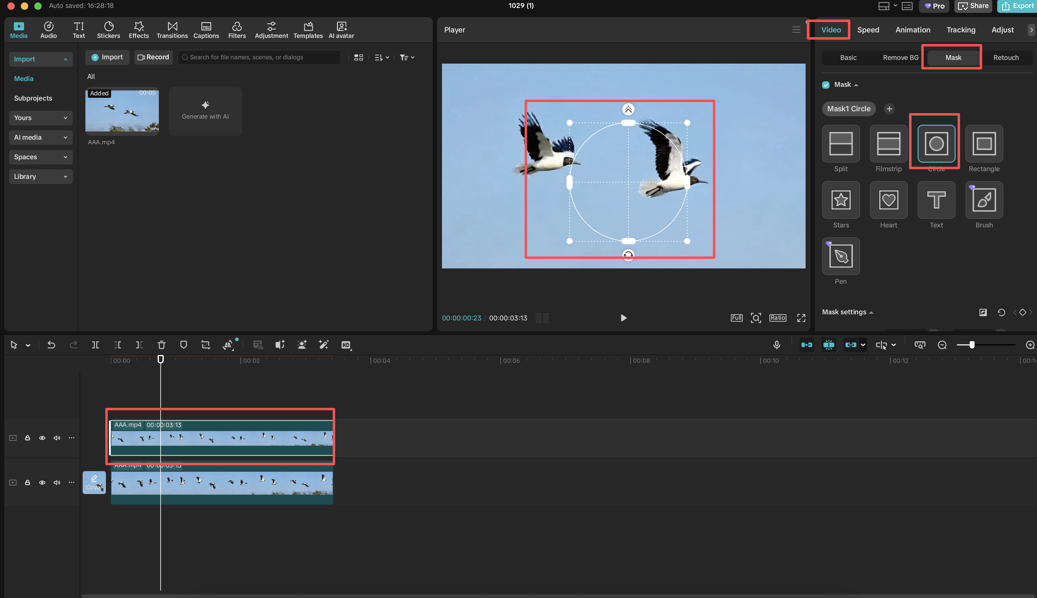 Circular mask applied over one bird on the upper track of a layered video project