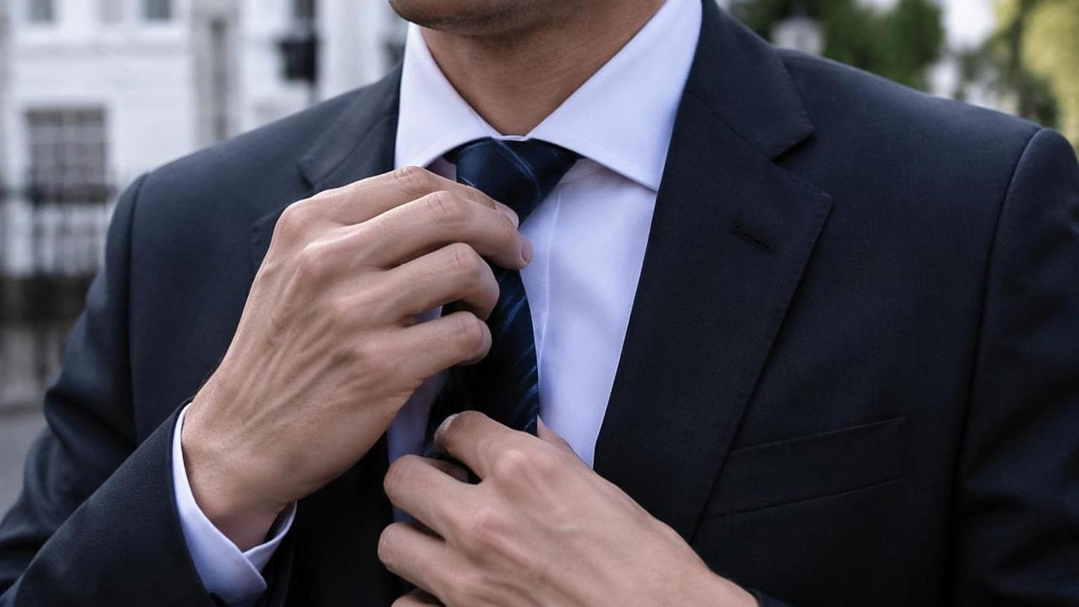 Dreamina remove tie from video prompt example 2: Repair the background naturally