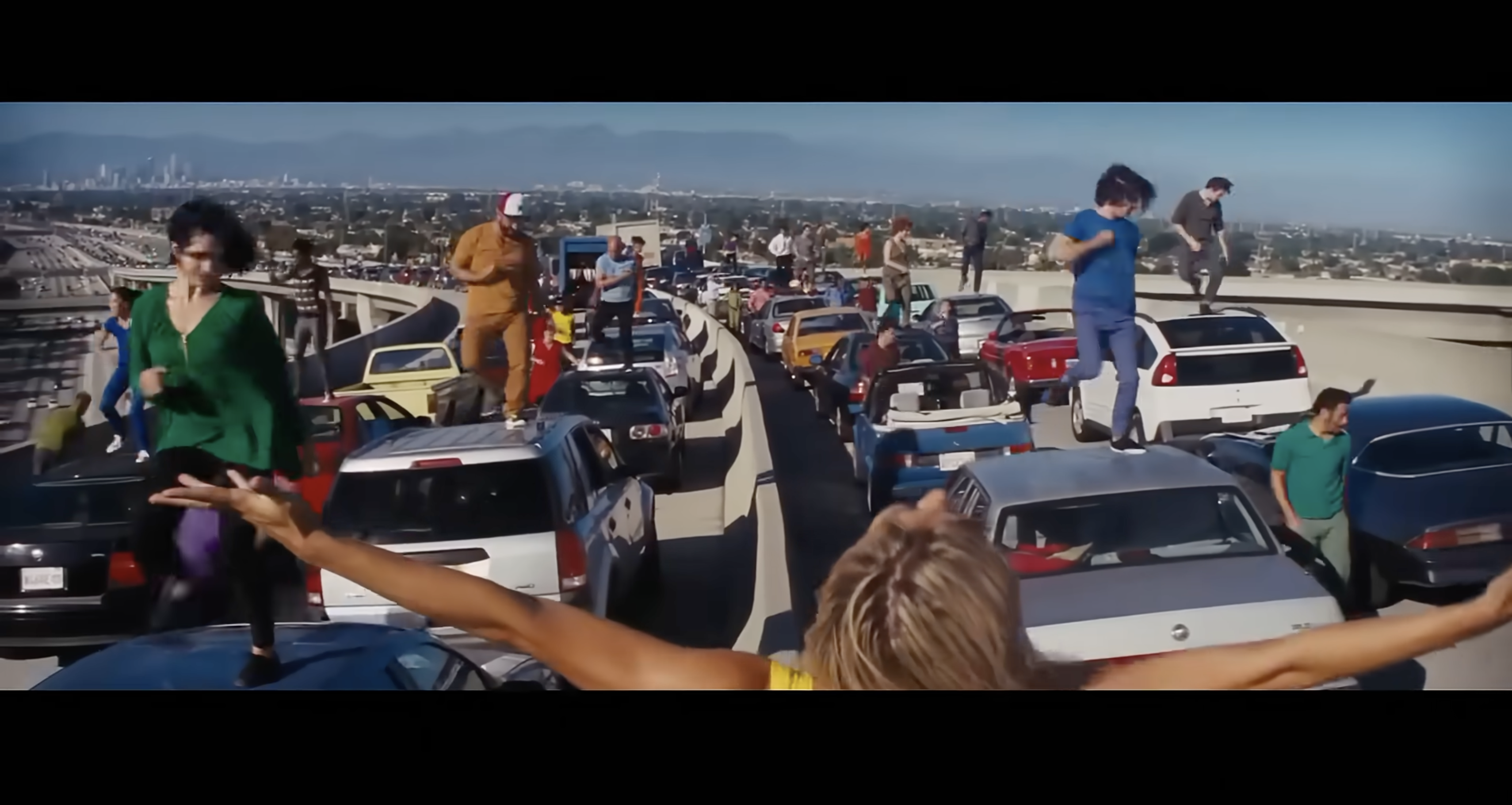 Dynamic crane and tracking shot from La La Land opening