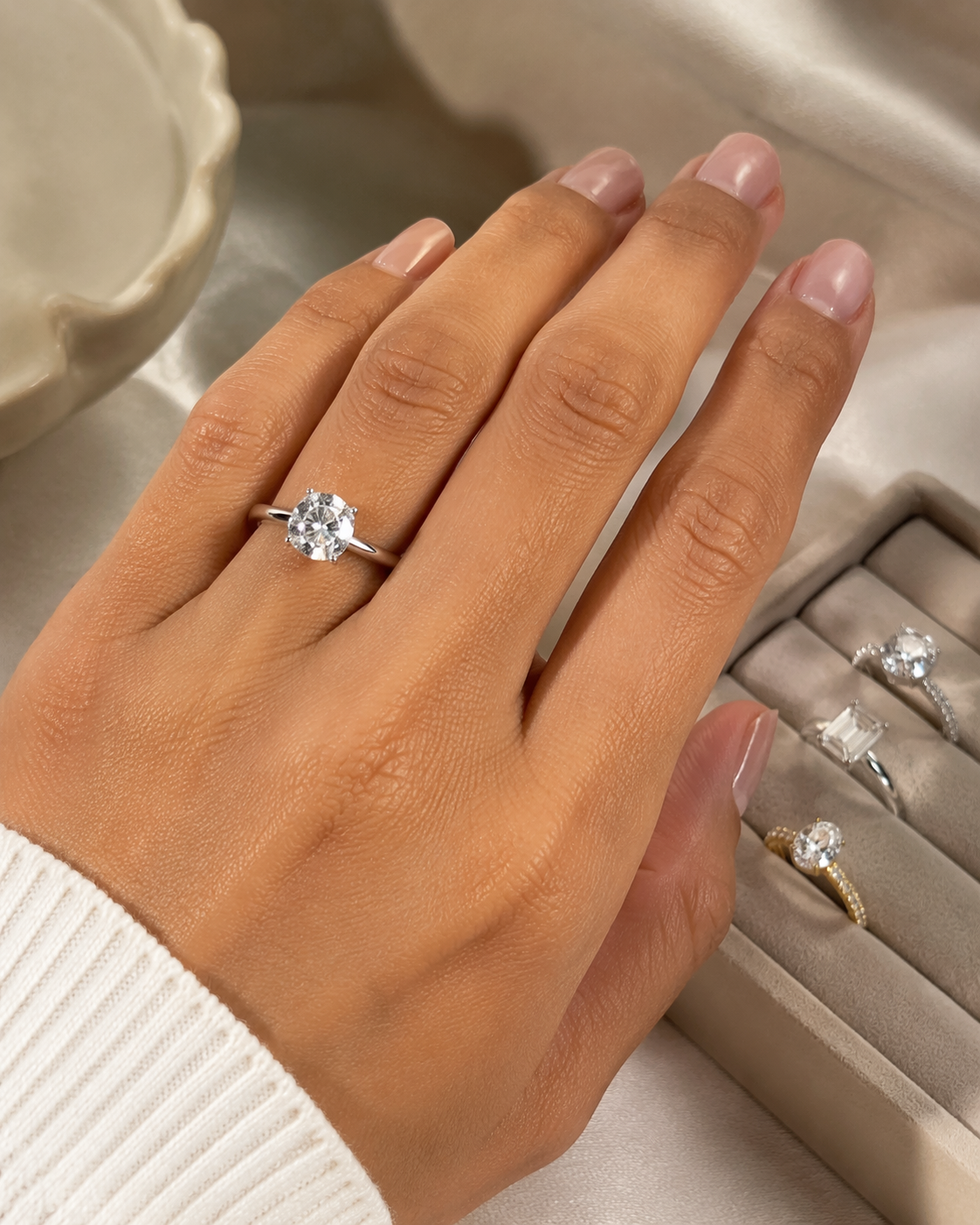 Dreamina virtual engagement ring try on prompt example 1: oval solitaire engagement ring preview