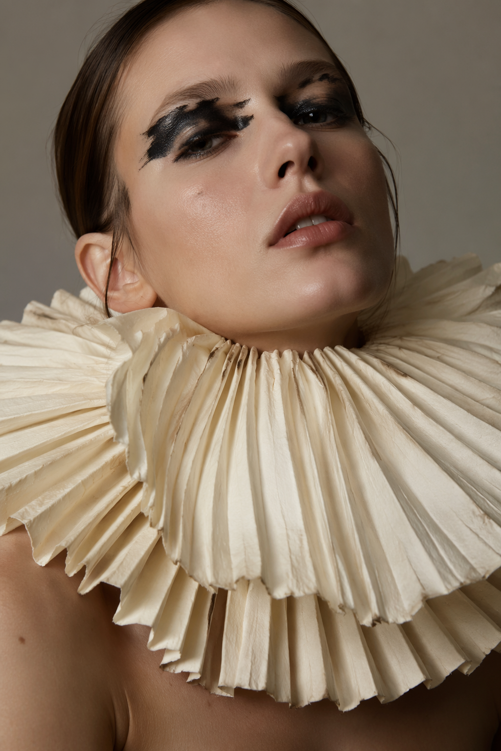 Dreamina AI avant garde filter prompt example 1: Sculptural Collar Portrait
