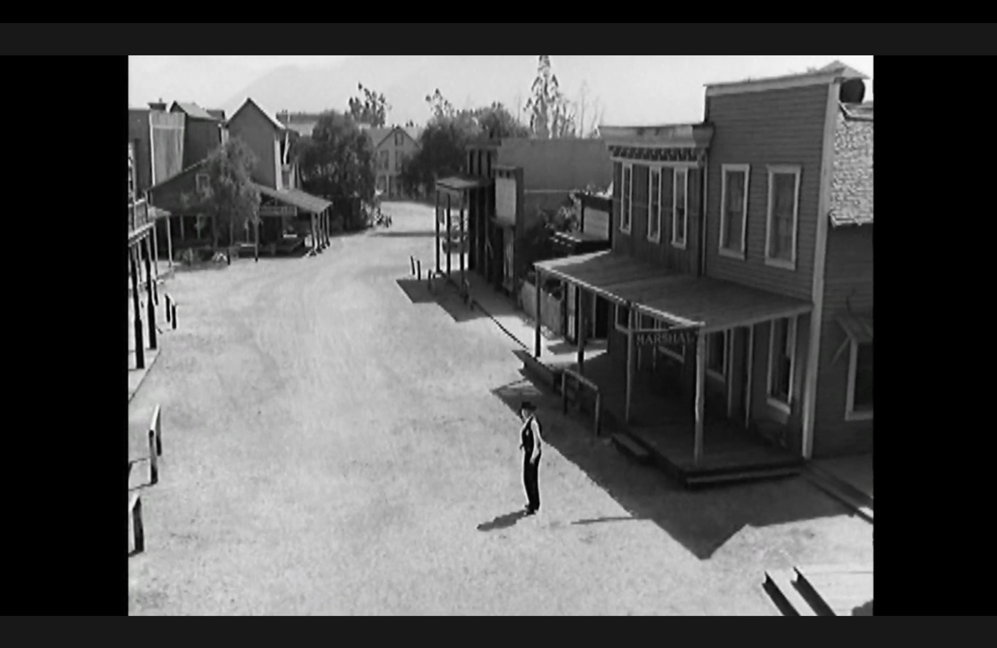 Crane upshot from High Noon showing an empty street